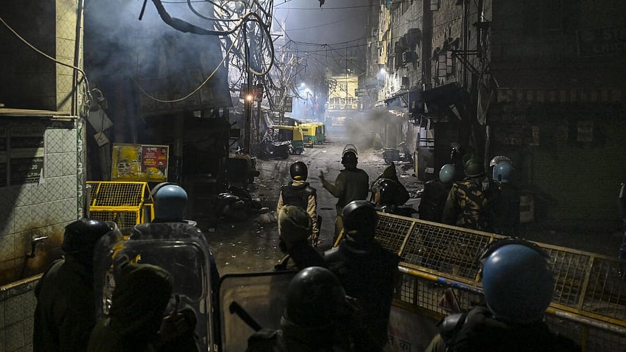 <div class="paragraphs"><p>Security personnel at the site after violence erupted during an anti-encroachment drive near the Faiz-e-Elahi mosque in Ramlila Maidan area, in New Delhi.</p></div>