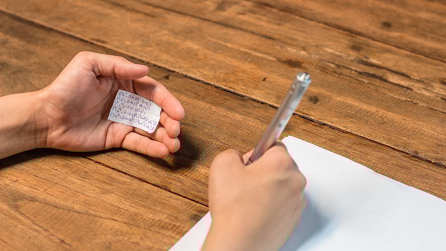 <div class="paragraphs"><p>Cheating in exam. (Image for representation)</p></div>