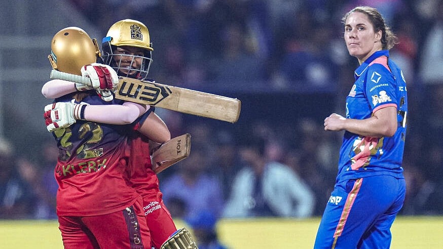 <div class="paragraphs"><p>Royal Challengers Bengaluru’s Nadine de Klerk and Prema Rawat celebrate after winning the Women's Premier League (WPL) T20 cricket match between Mumbai Indians and Royal Challengers Bengaluru</p></div>