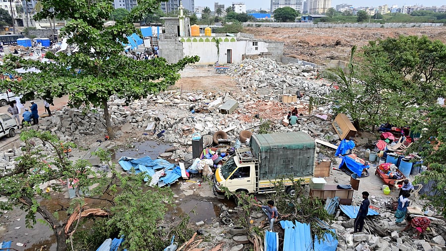 <div class="paragraphs"><p>Residents salvage household items during the demolition drive at Thanisandra. </p></div>