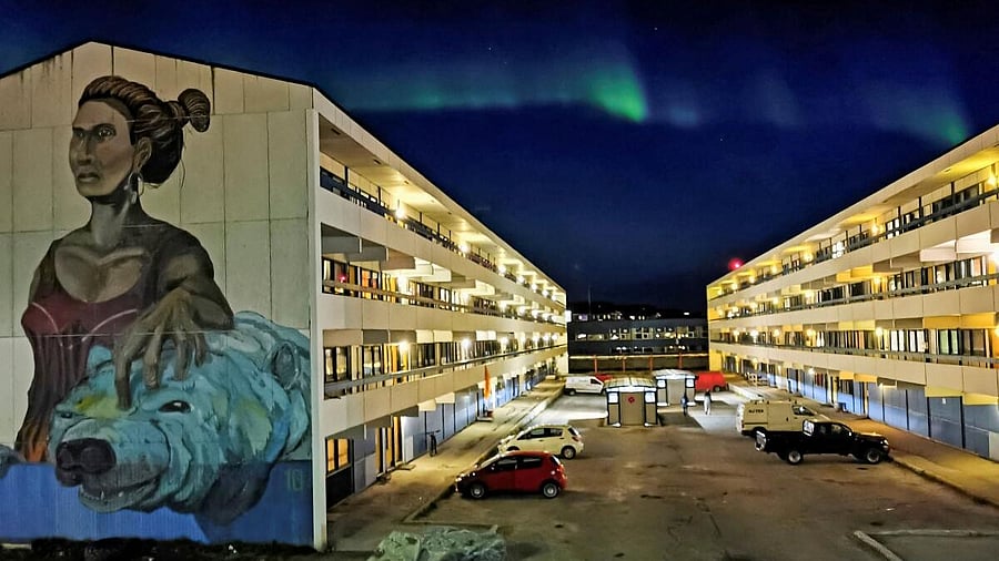 <div class="paragraphs"><p>The Aurora Borealis (Northern Lights) is seen behind a building with social housings with a mural in Nuuk, Greenland.</p></div>