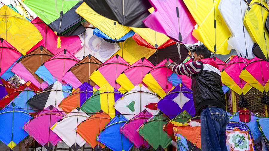 <div class="paragraphs"><p>A vendor at his stall selling kites ahead of the 'Lohri' festival, in Amritsar, Punjab</p></div>