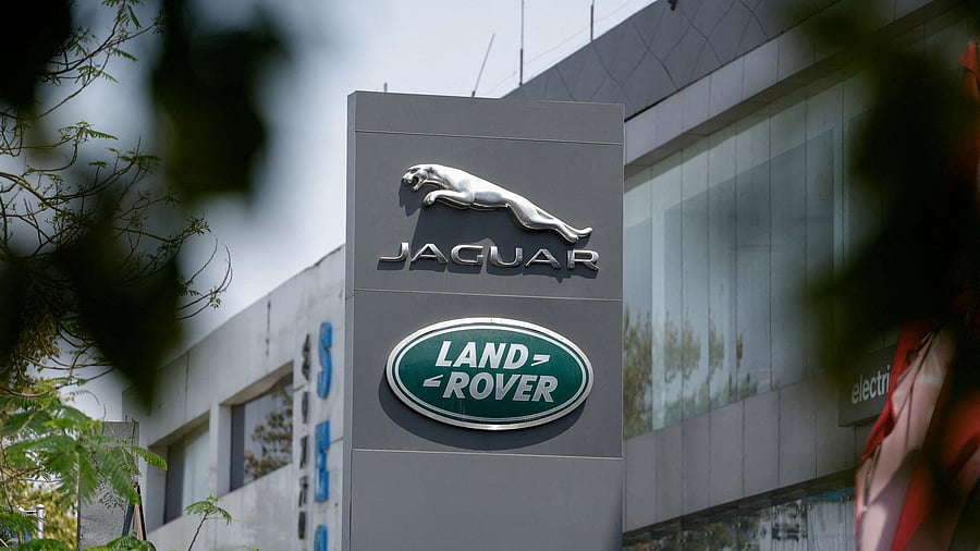 <div class="paragraphs"><p>Jaguar and Land Rover, the British vehicle-brand logos of Indian-owned Tata Motors, are displayed in front of their showroom in New Delhi</p></div>