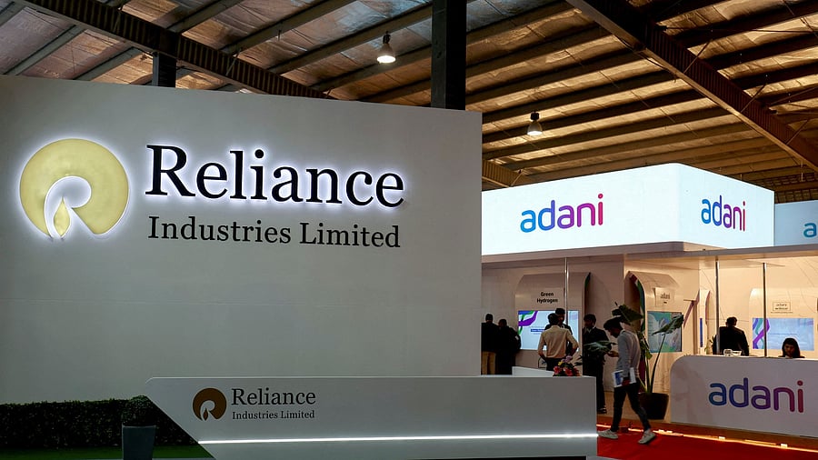 <div class="paragraphs"><p>The logo of Reliance Industries and Adani Enterprise.</p></div>