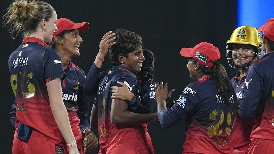 <div class="paragraphs"><p>Royal Challengers Bengaluru's Arundhati Reddy, centre, with teammates celebrate after the wicket of UP Warriorz's Shweta Sehrawat </p></div>