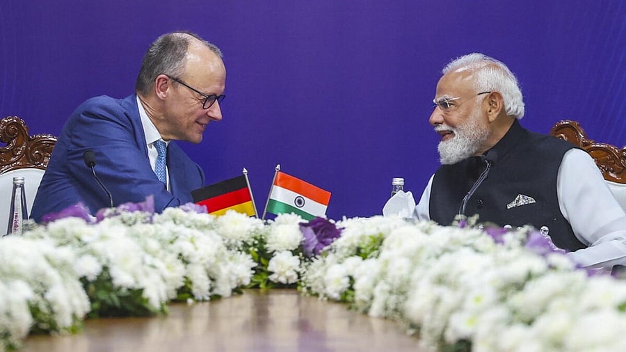 <div class="paragraphs"><p>Prime Minister Narendra Modi and German Chancellor Friedrich Merz during the India-Germany CEOs Forum at Mahatma Mandir Convention Centre, in Gandhinagar, Gujarat.</p></div>