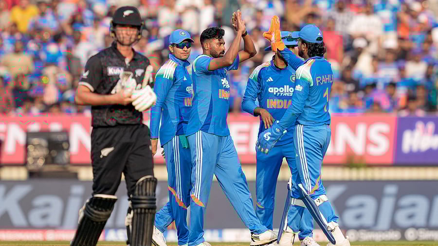 <div class="paragraphs"><p>Indian team celebrates a wicket.</p></div>