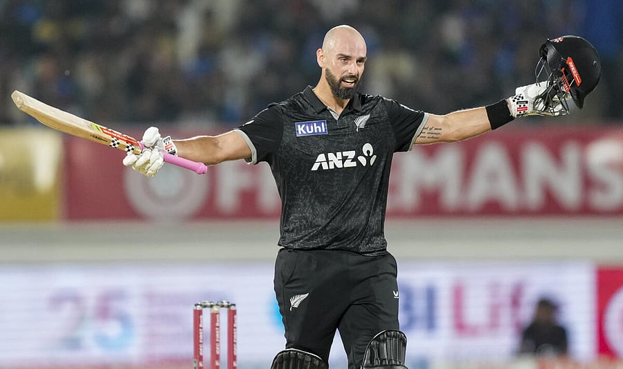 <div class="paragraphs"><p>New Zealand's Daryl Mitchell celebrates his century during the second ODI cricket match between India and New Zealand, at Niranjan Shah Stadium, in Rajkot, Gujarat, Wednesday, Jan. 14, 2026.</p></div>