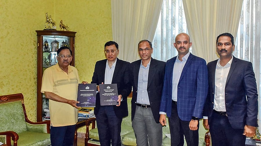 Committee members, headed by ADGP (L&amp;O) R Hithendra, submit the report to Home Minister G Parameshwara (left) in Bengaluru on Wednesday.