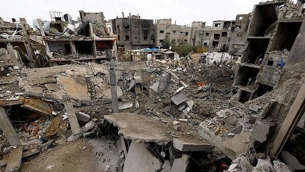 <div class="paragraphs"><p>Aftermath of an Israeli strike on a house, in the central Gaza Strip.</p></div>