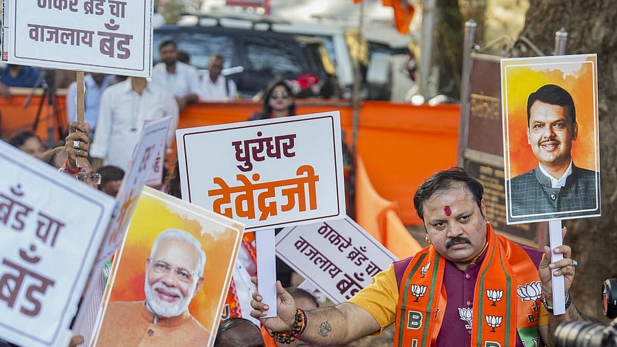 <div class="paragraphs"><p>BJP workers hold placards during celebrations of their party's victory in the BMC elections, in Mumbai, Friday, Jan. 16, 2026. </p></div>
