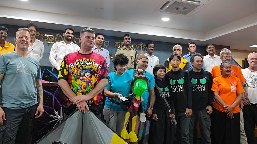<div class="paragraphs"><p>Kite flyers from various countries with DC Darshan H V and Team Mangalore. </p></div>