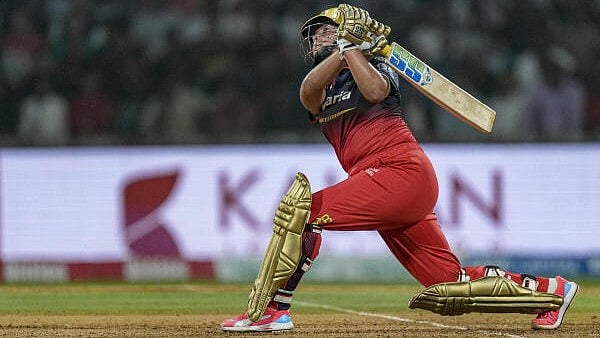 <div class="paragraphs"><p>Royal Challengers Bengaluru's Radha Yadav plays a shot during the Women's Premier League (WPL)&nbsp;between Royal Challengers Bengaluru and Gujarat Giants, at the DY Patil Stadium, in Navi Mumbai.</p></div>
