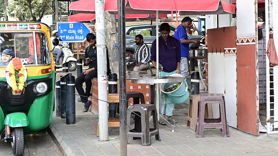 <div class="paragraphs"><p>Encroachments on a footpath in Gandhinagar. </p></div>