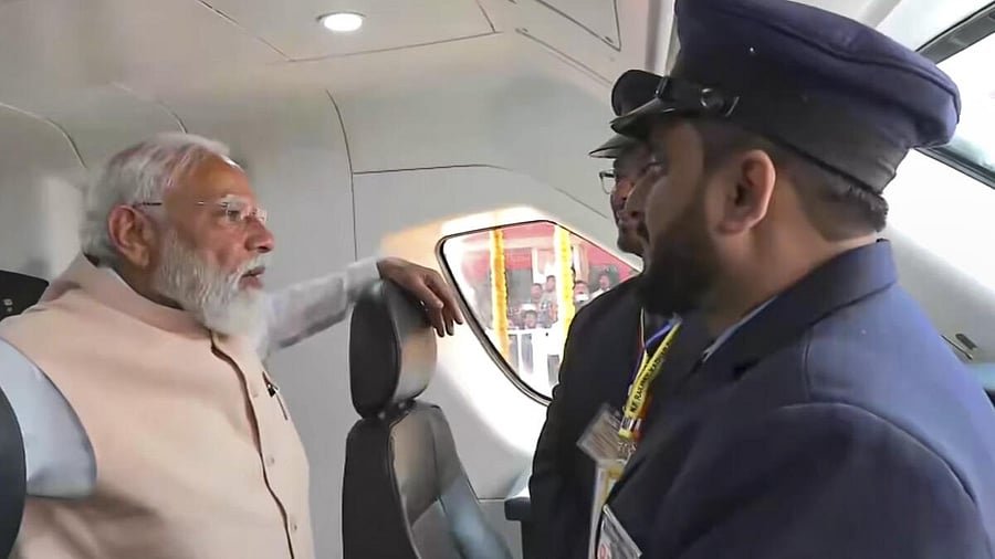 <div class="paragraphs"><p>Prime Minister Narendra Modi interacts with loco pilots inside the newly inaugurated India’s first Vande Bharat sleeper train between Howrah and Guwahati, in Malda, West Bengal.</p></div>