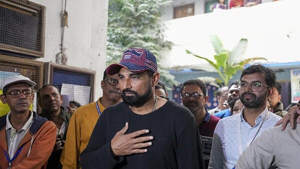 <div class="paragraphs"><p>Mohammed Shami after appearing before poll officials for his scheduled hearing under the ongoing special intensive revision (SIR) of electoral rolls, in Kolkata</p></div>