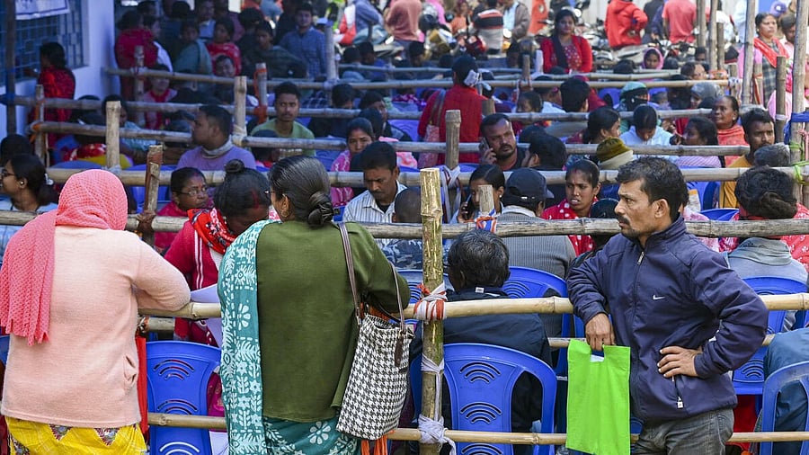 <div class="paragraphs"><p>People wait in queues at a centre during hearings under the Special Intensive Revision (SIR) of electoral rolls, in Balurghat, Dakshin Dinajpur district, West Bengal. PTI</p></div>