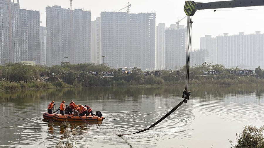 <div class="paragraphs"><p> Search operation underway after a 27-year-old software engineer died, whose car had plunged into a water-filled pit at a construction site.</p></div>