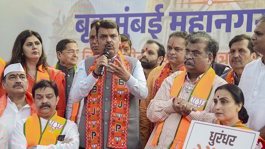 <div class="paragraphs"><p>Maharashtra Chief Minister Devendra Fadnavis, centre, with state BJP President Ravindra Chavan, right, after the party’s victory in the BMC elections 2026.</p></div>