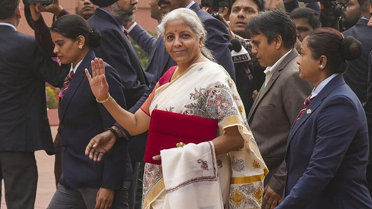 <div class="paragraphs"><p>Union Finance Minister Nirmala Sitharaman arrives to present the Union Budget 2025-26 at the Parliament House complex, in New Delhi.</p></div>