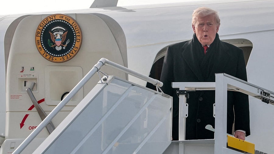 <div class="paragraphs"><p>Donald Trump disembarks Air Force One en route to the World Economic Forum in Davos, at Zurich International Airport in Zurich, Switzerland January 21, 2026.</p></div>