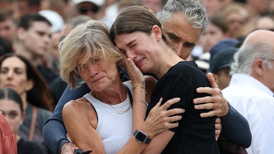 <div class="paragraphs"><p>A woman cries as she pays her respects at Bondi Pavilion to victims of a shooting during a Jewish holiday celebration at Bondi Beach, in Sydney. Reuters file photo</p></div>