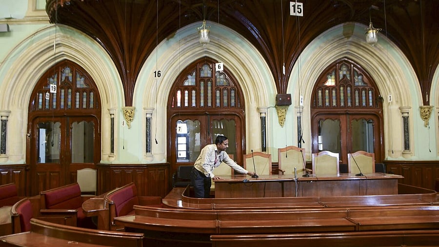 <div class="paragraphs"><p>A worker cleans the BMC office ahead of the arrival of newly elected members following the civic elections, in Mumbai. </p></div>