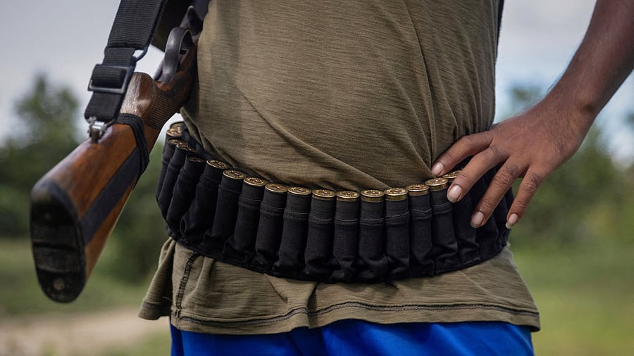 <div class="paragraphs"><p>A file photo of an armed Kuki man at a checkpoint at Kangvai village in Churachandpur district of Manipur.</p></div>