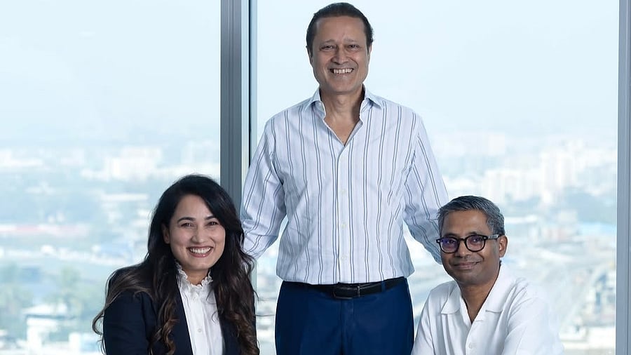 <div class="paragraphs"><p>Vineet Jain with Myra Karn and Raj Kumar Gupta.</p></div>
