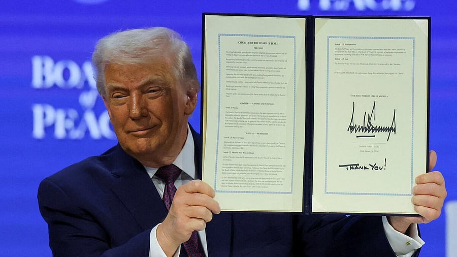 <div class="paragraphs"><p>US President Donald Trump holds a signed Charter of the Board of Peace, as he takes part in a charter announcement for his Board of Peace initiative aimed at resolving global conflicts, alongside the 56th annual World Economic Forum (WEF), in Davos, Switzerland</p></div>