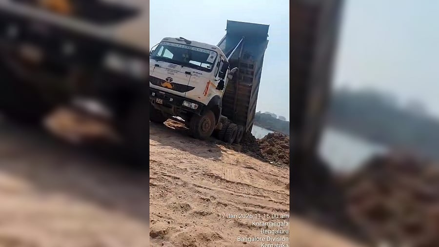 <div class="paragraphs"><p>A truck seen dumping construction debris directly into the lake.&nbsp;</p></div>
