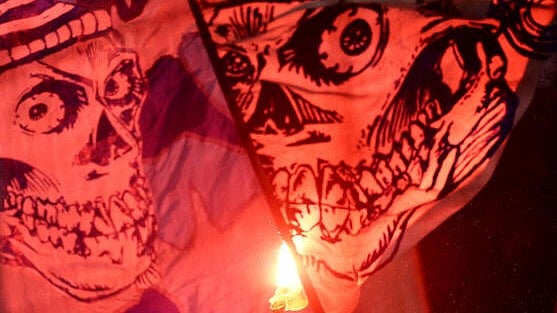 <div class="paragraphs"><p>Olympique de Marseille fan holding a flare in the stands during the match.</p></div>