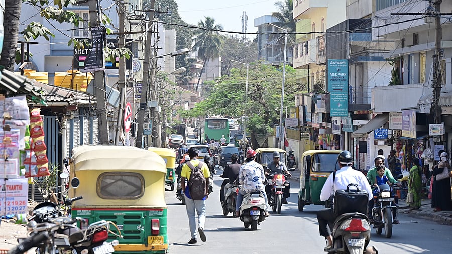 <div class="paragraphs"><p>Deep potholes and broken stretches plague Dinnur Main Road.&nbsp;</p></div>