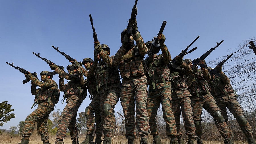 <div class="paragraphs"><p>Indian Army personnel take part in an exercise ahead of the 77th Republic Day, near Line of Control (LoC), on the outskirts of Jammu.</p></div>