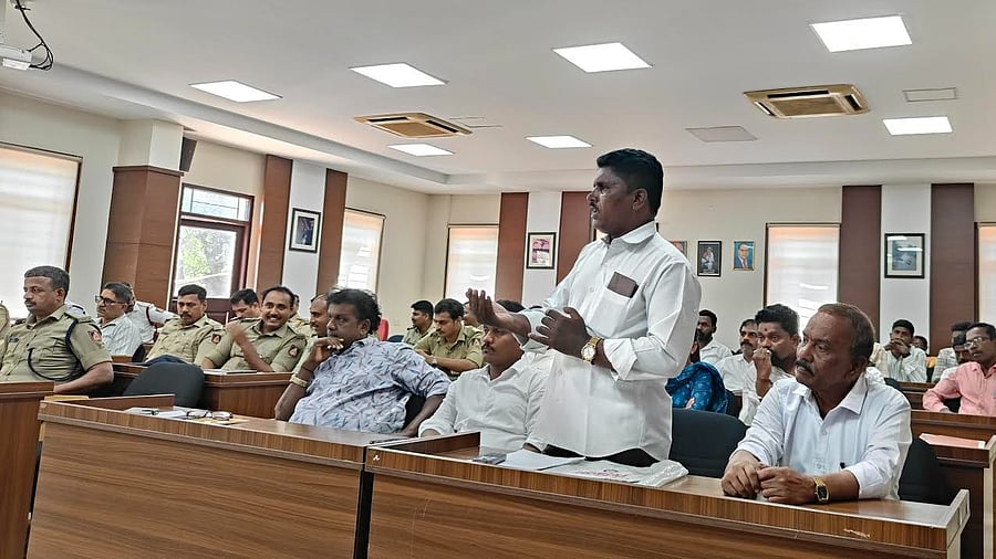 <div class="paragraphs"><p>Dalit leader S P Anand raises a point during the monthly SC/ST grievances redressal meeting held at the Mangaluru Police Commissionerate office on Sunday. </p></div>