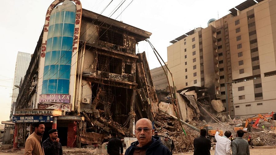 <div class="paragraphs"><p>Aftermath of fire in a shopping mall in Karachi.</p></div>