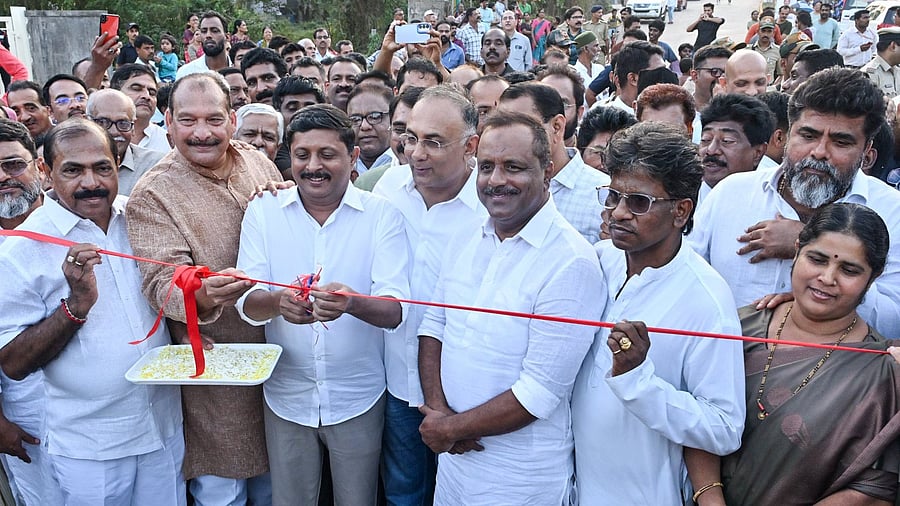 <div class="paragraphs"><p>Urban Development Minister Byrathi Suresh inaugurates&nbsp;Mahakalipadpu Railway Underbridge on Sunday.</p></div>