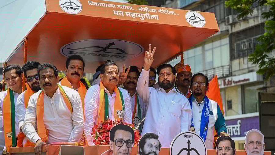 <div class="paragraphs"><p>File Photo: Maharashtra CM Eknath Shinde, BJP MLA from Airoli Ganesh Naik and Ex-MP Sanjeev Naik, during a public rally.</p></div>