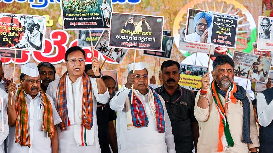 <div class="paragraphs"><p>Chief Minister Siddaramaiah, Deputy Chief Minister and KPCC President DK Shivakumar, AICC General Secretary Randeep Singh Surjewala, along with senior leaders of Congress stage 'Raj Bhavan Chalo' protest against scrapping of the Mahatma Gandhi National Rural Employment Guarantee Act (MGNREGA), at Freedom Park, Benglauru on Tuesday, January 27, 2026. </p></div>