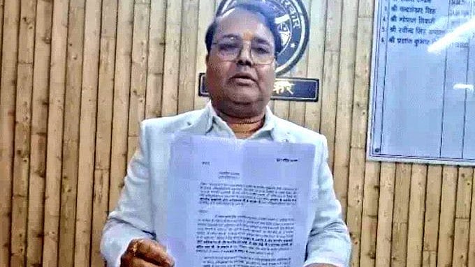 <div class="paragraphs"><p>Ayodhya GST Commissioner Prashant Kumar Singh with his resignation paper.</p></div>