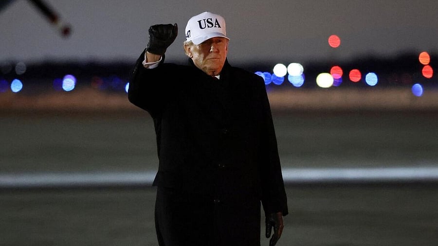 <div class="paragraphs"><p>US President Donald Trump gestures after deboarding Air Force One.</p></div>