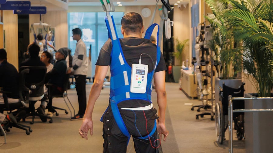A man paralysed from the chest down following a spinal cord injury uses xStep at a rehab facility in Koramangala.
