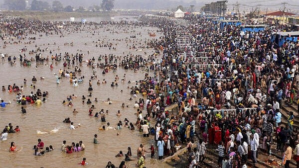 <div class="paragraphs"><p>People take a holy dip in the rivulet Jampanna Vagu during the four-day 'Maha Jathara' of tribal goddesses Sammakka and Saralamma, dubbed as one of the largest Adivasi spiritual congregations in the world, at Medaram, Mulugu district, Telangana.</p></div>