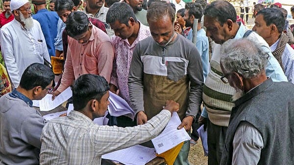 <div class="paragraphs"><p>People during hearings under the Special Intensive Revision (SIR) of electoral rolls in West Bengal.</p></div>