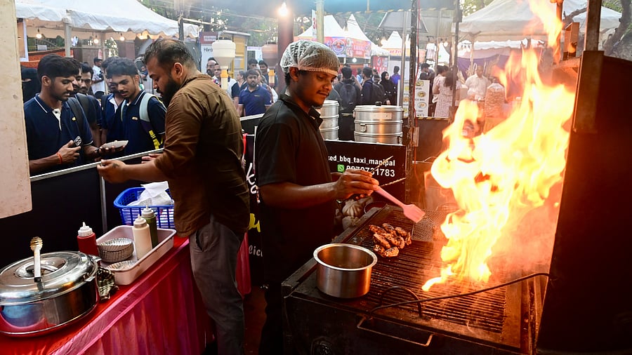 <div class="paragraphs"><p>A chef busy preparing delicacies at a street food festival organised as a part of Karavali Utsava held at Kadri Park in Mangaluru on Friday. </p></div>