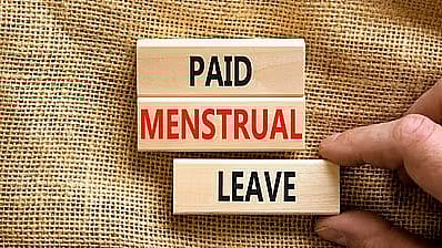 <div class="paragraphs"><p>Paid menstrual leave written on wood blocks (Representative image)</p></div>