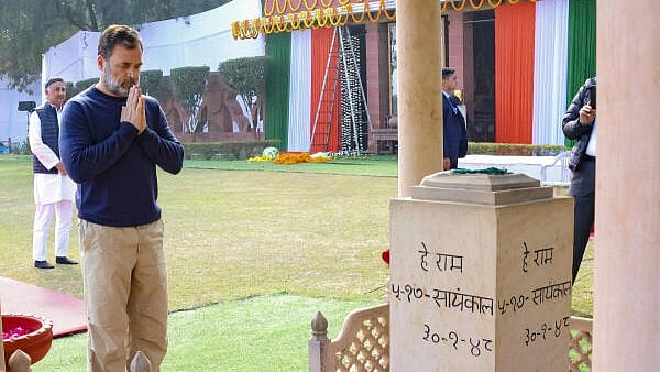<div class="paragraphs"><p>Rahul Gandhi pays tribute to Mahatma Gandhi on his death anniversary, commemorated as Martyrs' Day, at Gandhi Smriti, in New Delhi</p></div>