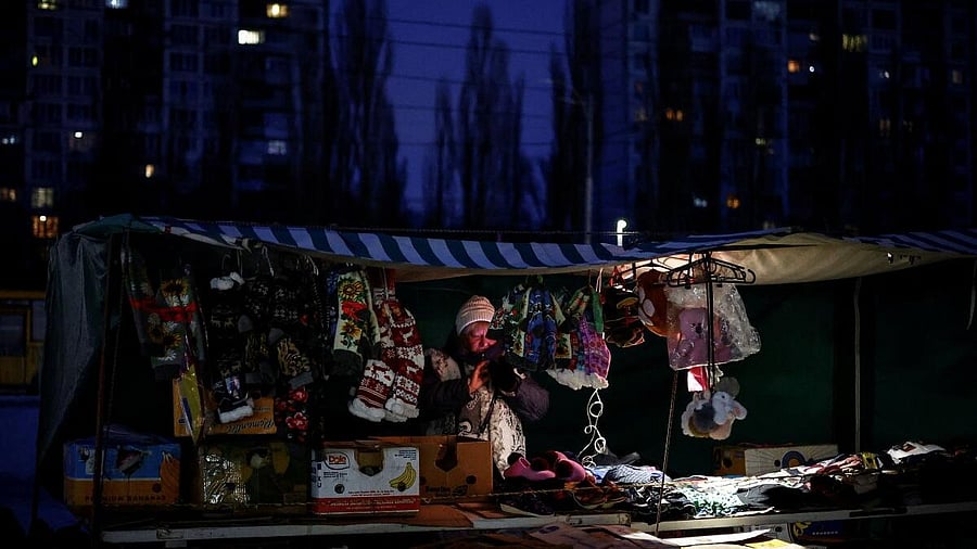 <div class="paragraphs"><p>A street vendor arranges goods at an outdoor stall as evening falls during sub-zero temperatures following recent Russian missile and drone strikes on civilian infrastructure, as power outages continue, amid Russia's attack on Ukraine, on a winter day in Kyiv, Ukraine.</p></div>