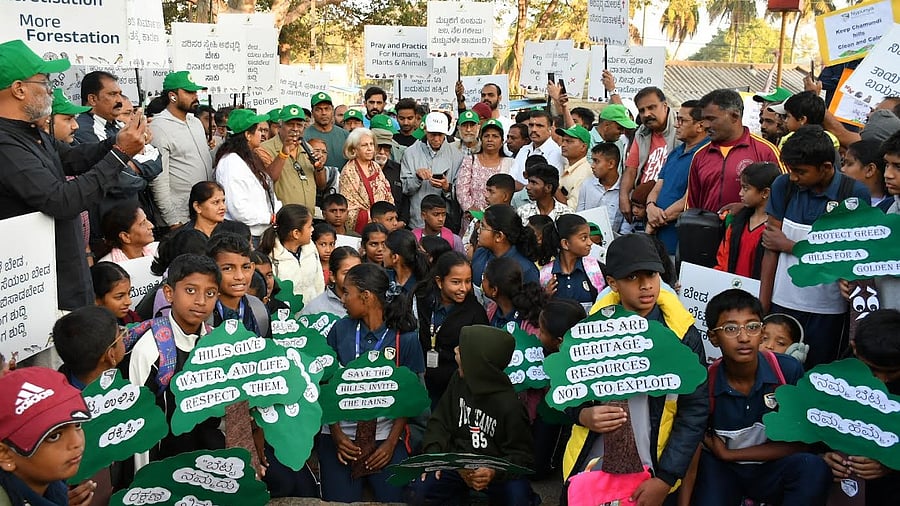 <div class="paragraphs"><p>Member of erstwhile royal family Pramodadevi Wadiyar, Major Gen (Retd) Sudhir G Vombatkere, Bhamy V Shenoy, Parashuramegowda, MLA Darshan Puttannaiah at the foot of Chamundi Hill on Sunday morning during awareness walk taken to save Chamundi Hill. </p></div>
