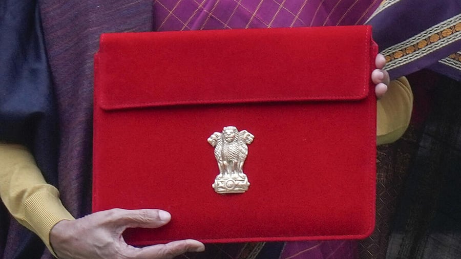 <div class="paragraphs"><p>Finance Minister Nirmala Sitharaman shows the digital tablet, enclosed in a traditional red 'bahi-khata' style pouch</p></div>